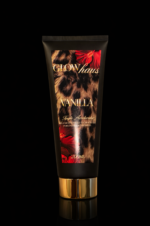 Tube of 'Glow Haus Vanilla' body wash with leopard print and red accents on a black background